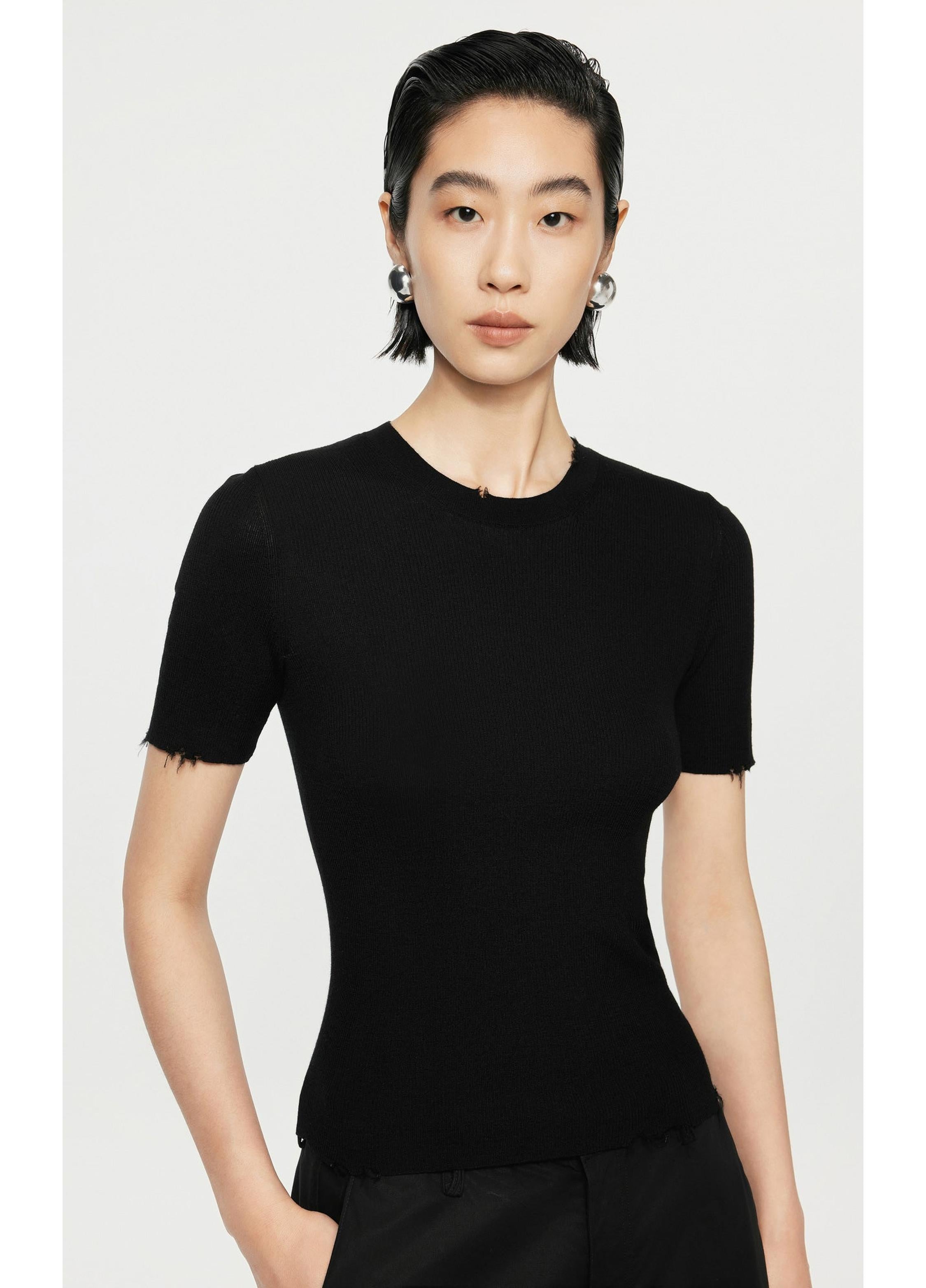 Suéter de punto de lana con efecto adelgazante