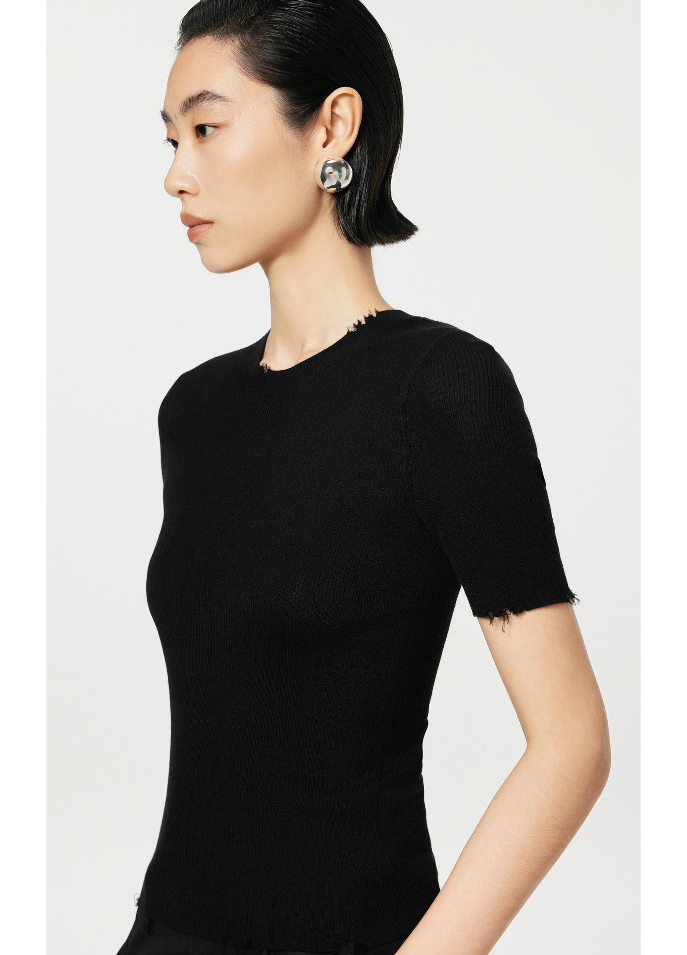 Suéter de punto de lana con efecto adelgazante