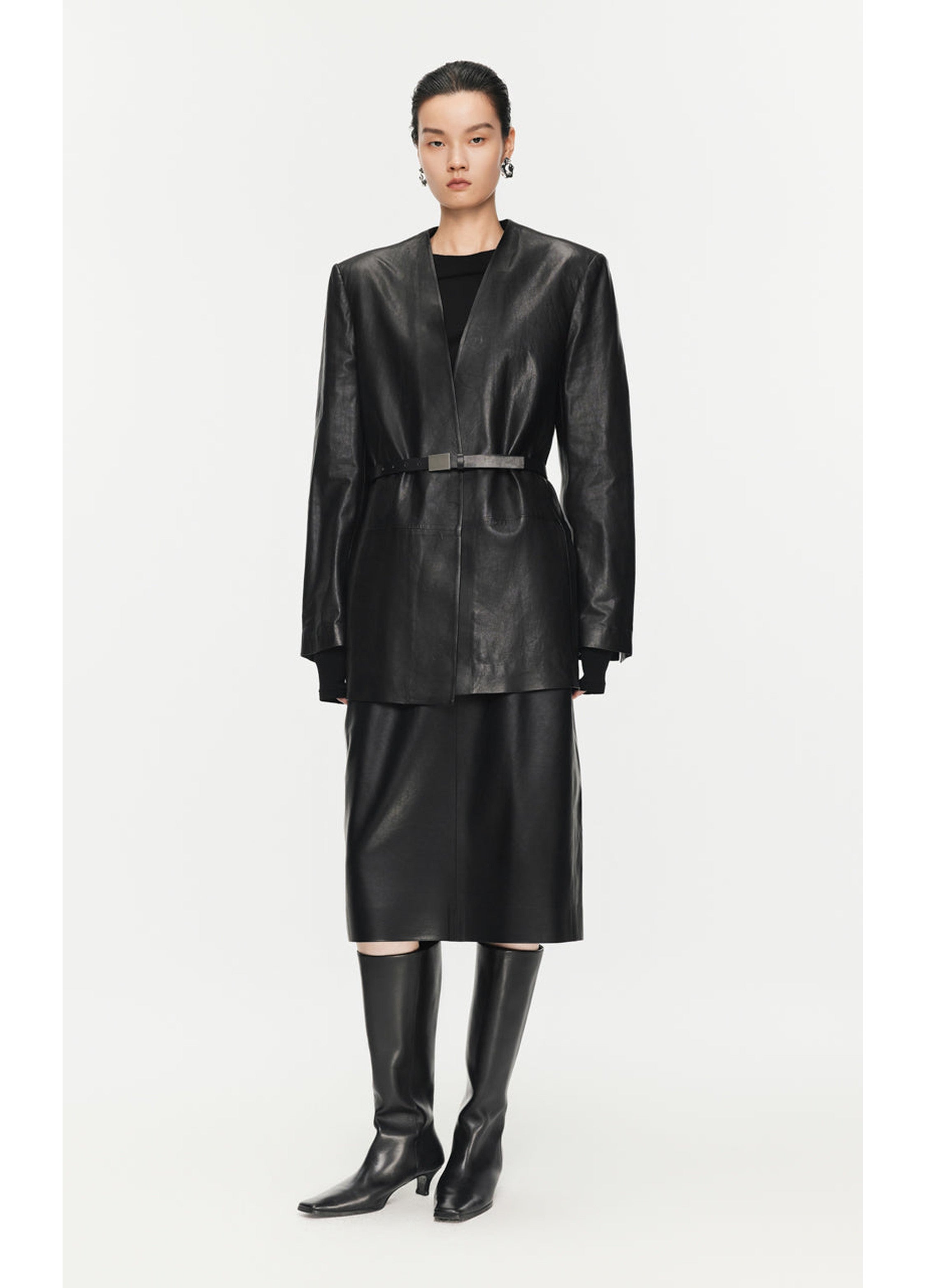 Falda de cintura de PU de longitud media