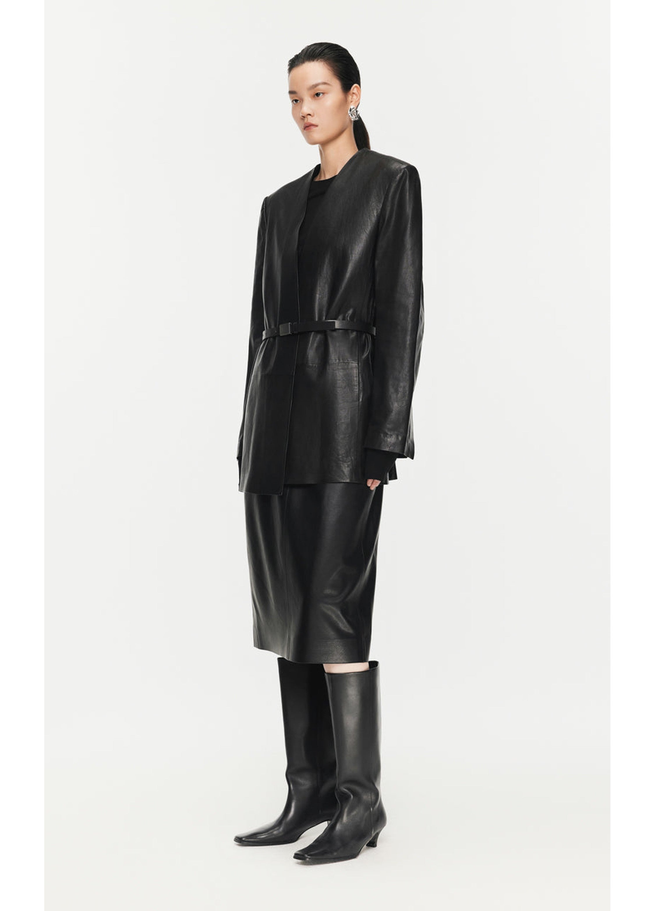 Falda de cintura de PU de longitud media