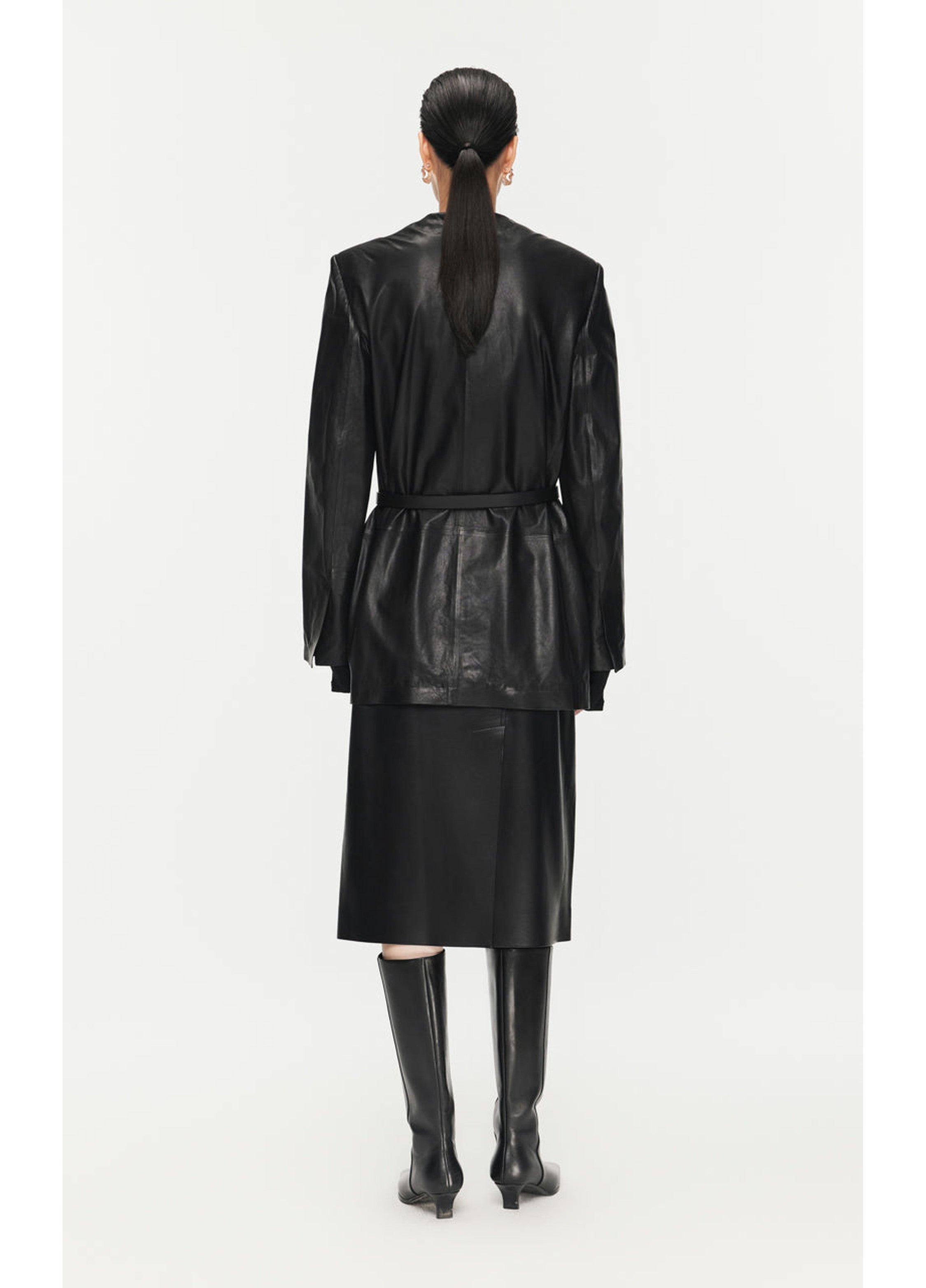 Falda de cintura de PU de longitud media