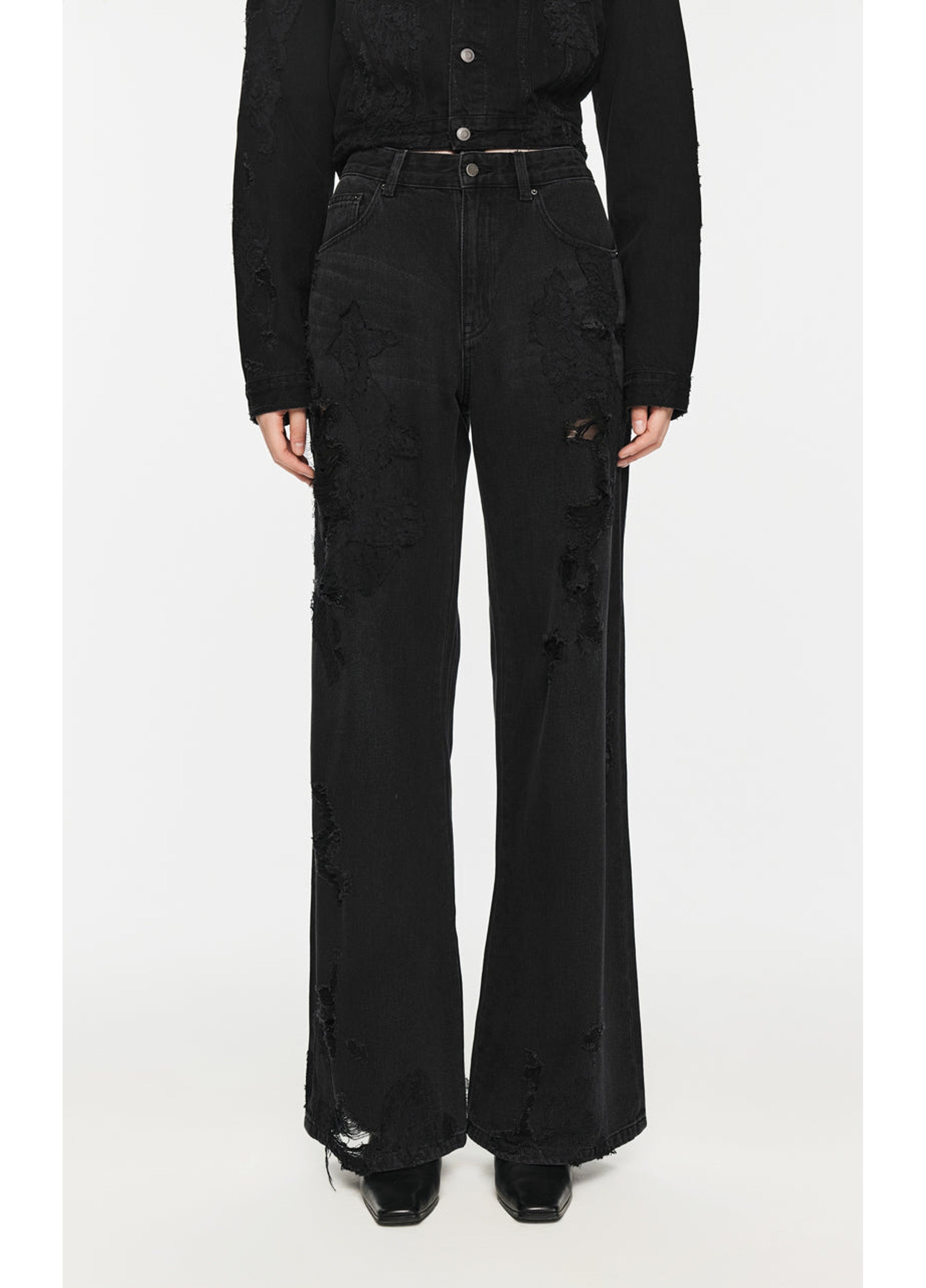 Vaqueros de pierna ancha con efecto desgastado